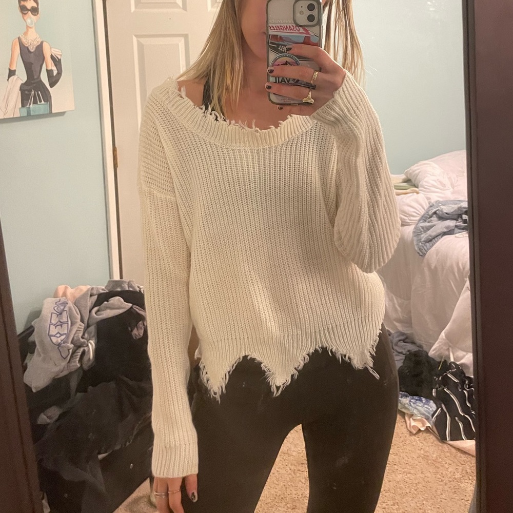 White sweater distressed